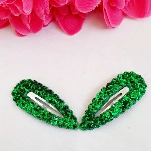 Green glitter snap clips